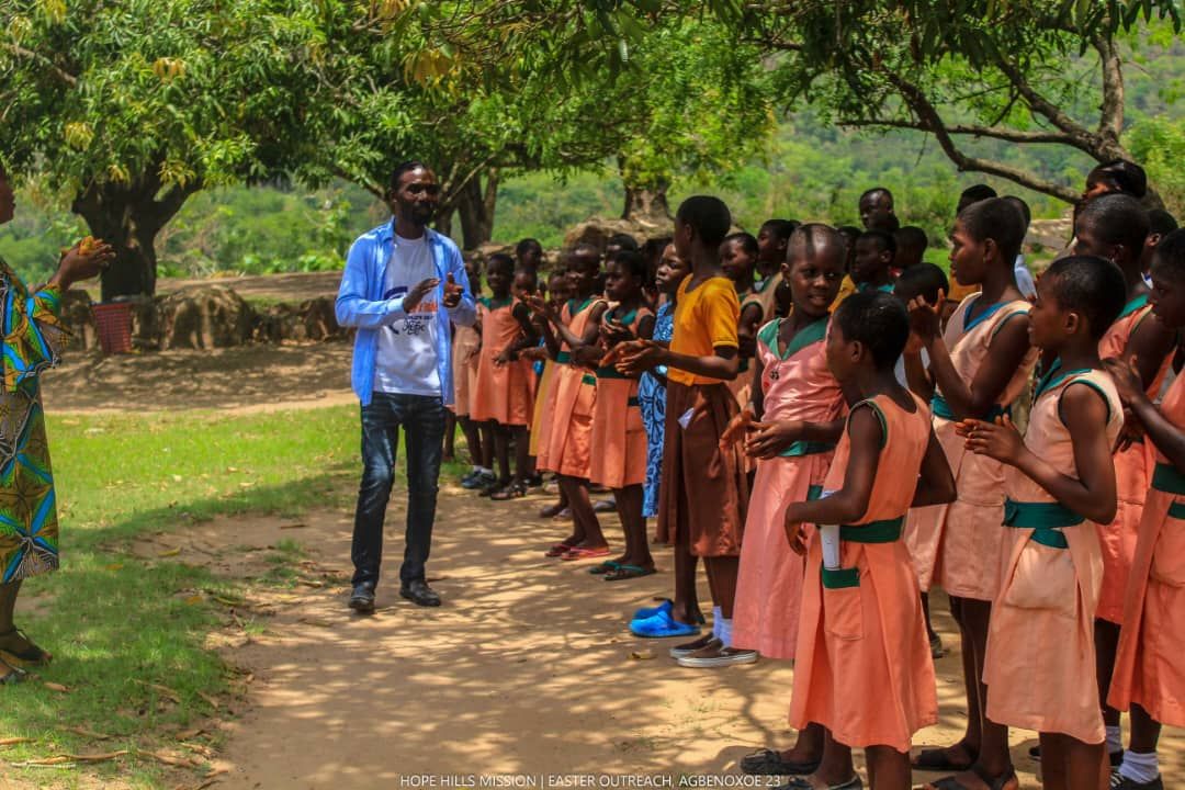 Hope Hills Mission serving children during an outreach in Ghana